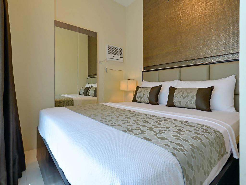 Currency Serviced Suites Manila Bagian luar foto