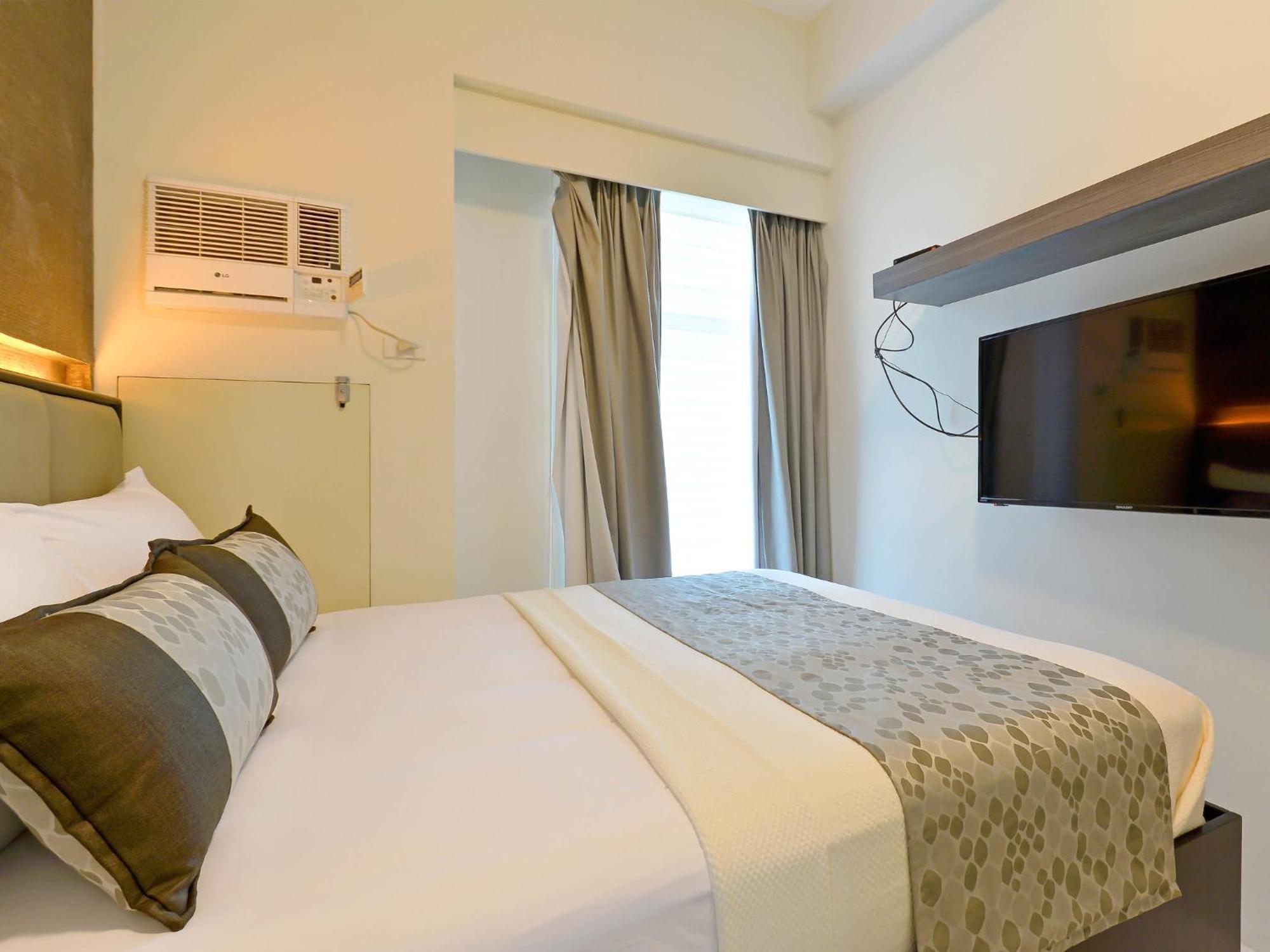 Currency Serviced Suites Manila Bagian luar foto