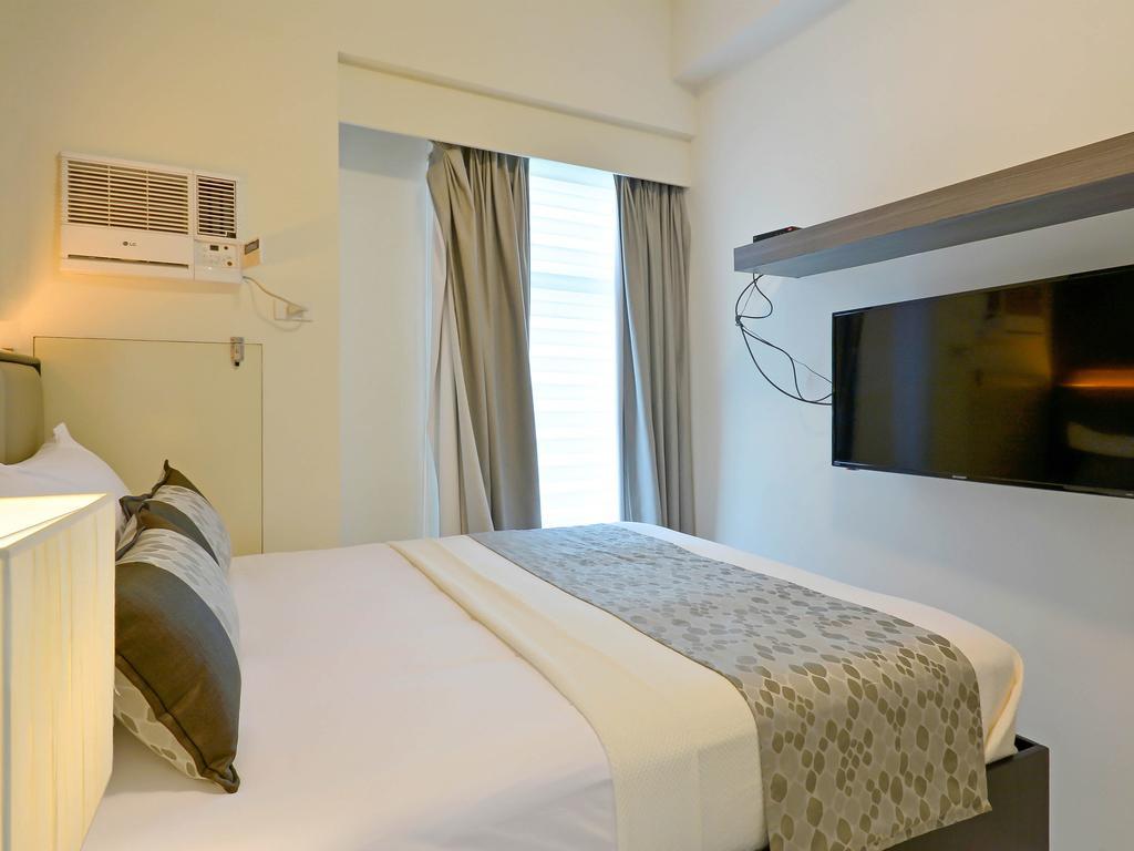 Currency Serviced Suites Manila Bagian luar foto