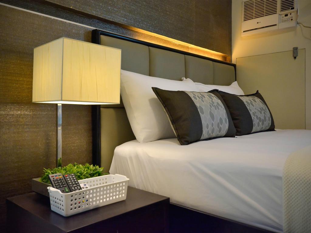 Currency Serviced Suites Manila Bagian luar foto