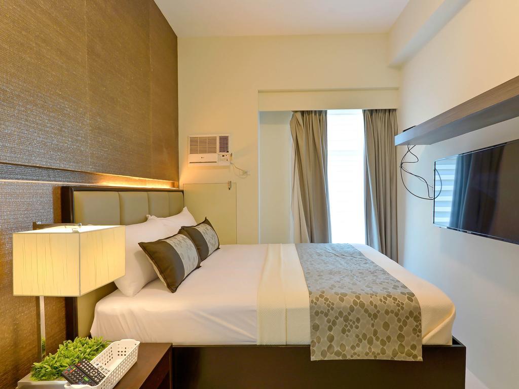 Currency Serviced Suites Manila Bagian luar foto