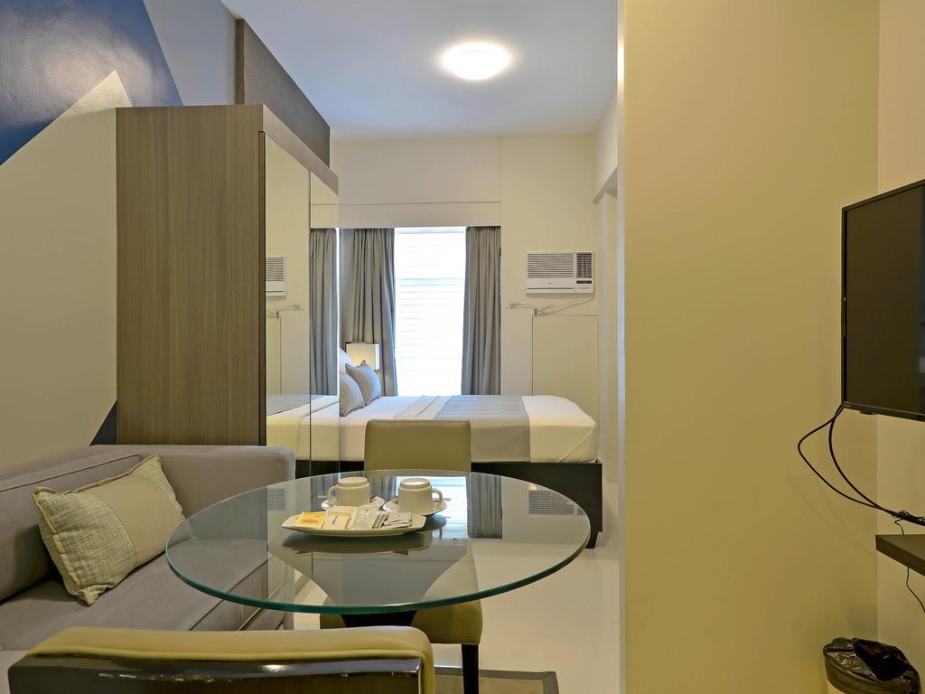 Currency Serviced Suites Manila Bagian luar foto