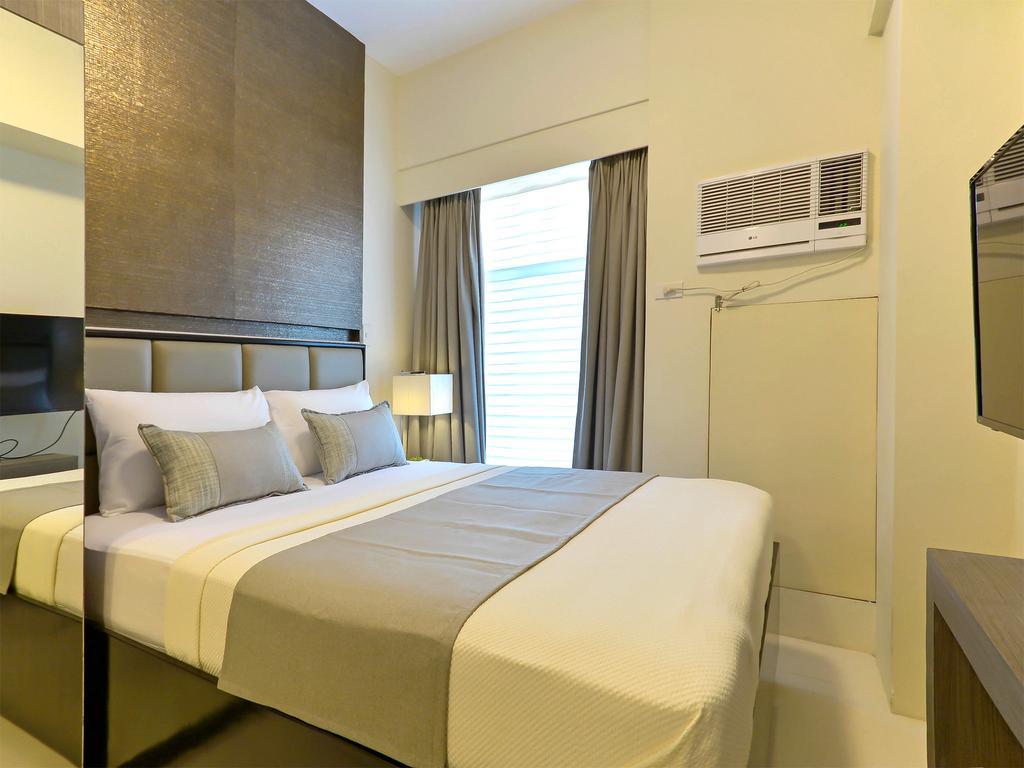 Currency Serviced Suites Manila Bagian luar foto