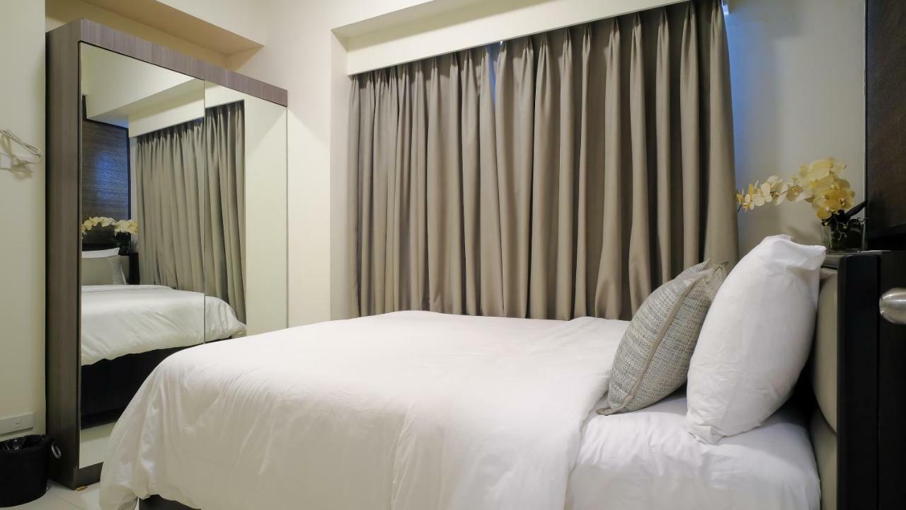 Currency Serviced Suites Manila Bagian luar foto